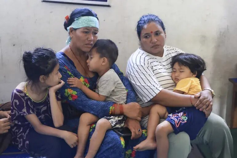 Displaced Nepalese mothers and children after the disaster